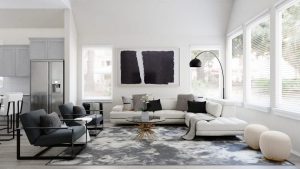 bright living room with white furniture and accent pillows. black abstract art and curvy floor lamp arching over the couch. gray rug with coffee table in the middle. two accent chairs on the left side.